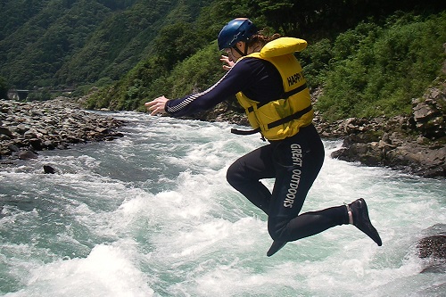 Chris jumping into Yoshino River rapids in Koboke Gorge, Shikoku