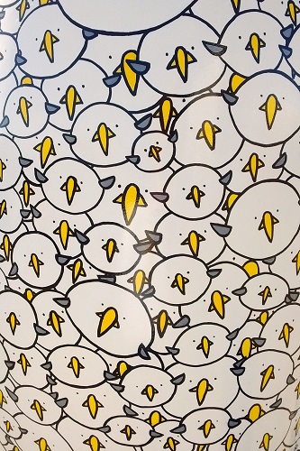 Densely packed penguin pattern on Engulfed at Maggie's Penguin Parade, Dundee, Scotland