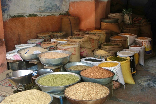 Open sacks of pulses and grains at a shop in Jaipur, India