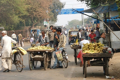 Fruit stalls on a busy road in Fatehpur Sikri, India