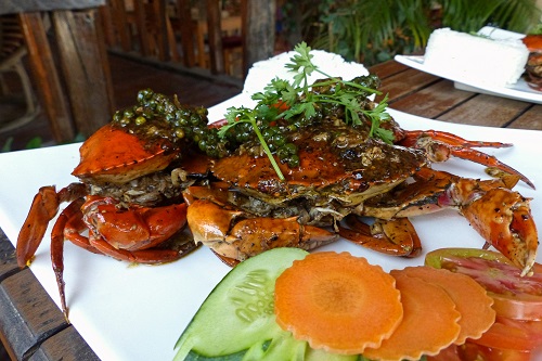 Plate of crabs covered in pepper in Kampot, Cambodia