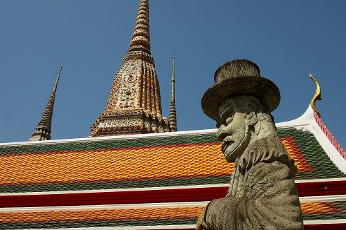 Statue of a giant at Wat Pho temple in Bangkok, Thailand