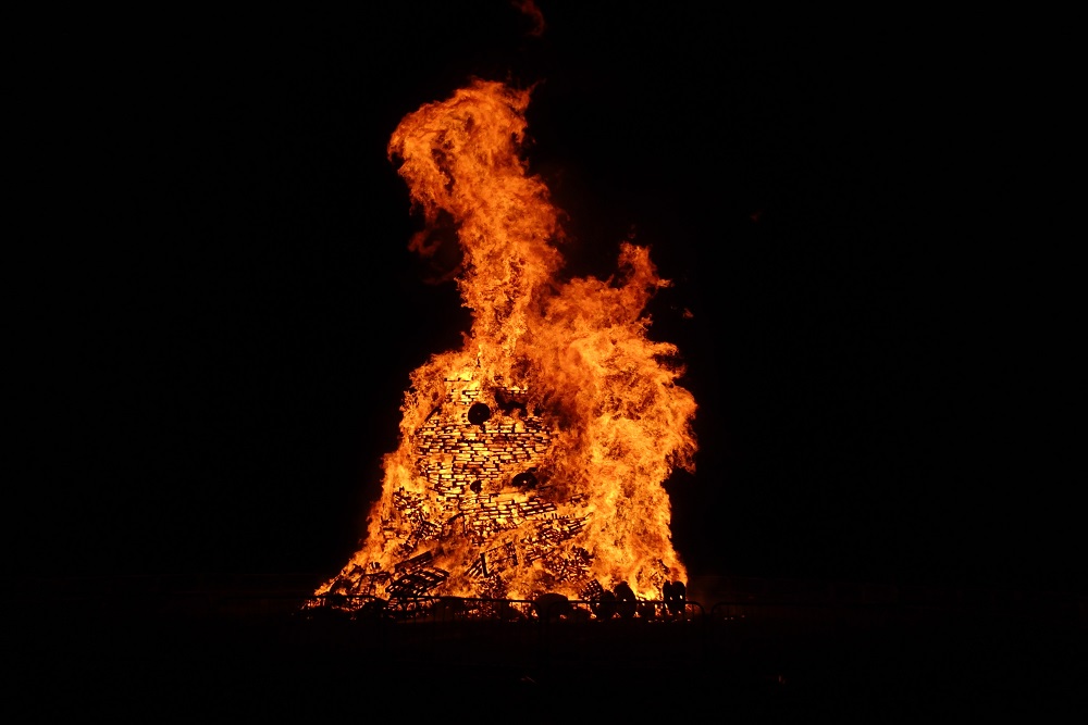 Huge pile of wooden pallets burning on bonfire night in Lancashire, England