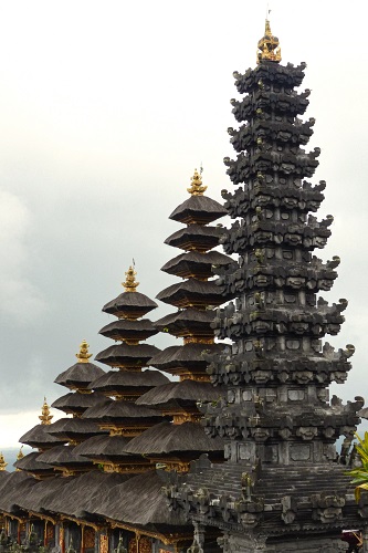 Row of 5 pagodas increasing in height at Pura Besakih temple in Bali, Indonesia