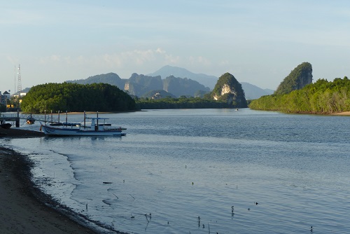 View of river and Khao Khanab Nam Cliffs from Krabi town, Thailand