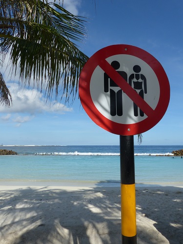 Swimwear sign at the artificial beach in Male, Maldives