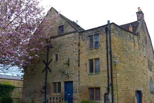 Bakewell bath house and cherry blossom in Peak District, England