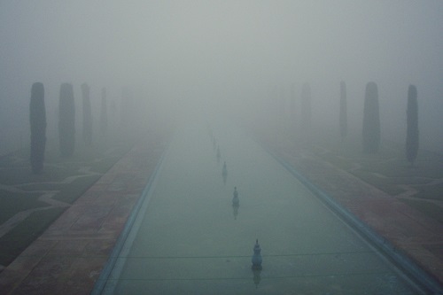 Taj Mahal obscured by mist in Agra, India