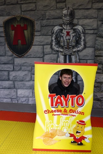Chris inside a giant bag of crisps on Tayto Castle tour in Northern Ireland
