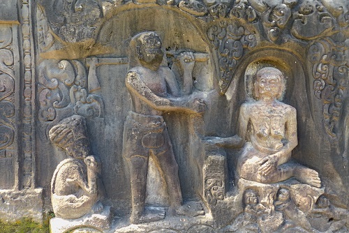 Holy man and hero rock carvings at Yeh Pulu in Bali, Indonesia