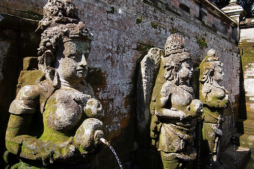 Fountain statues around Goa Gajah bathing pool in Bali, Indonesia