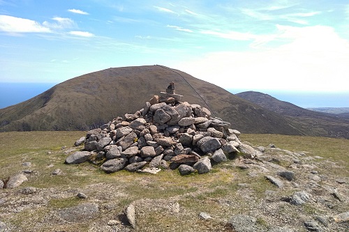 Cairn on Slieve Commedagh with view to Slieve Donard in the Mourne Mountains, Northern Ireland